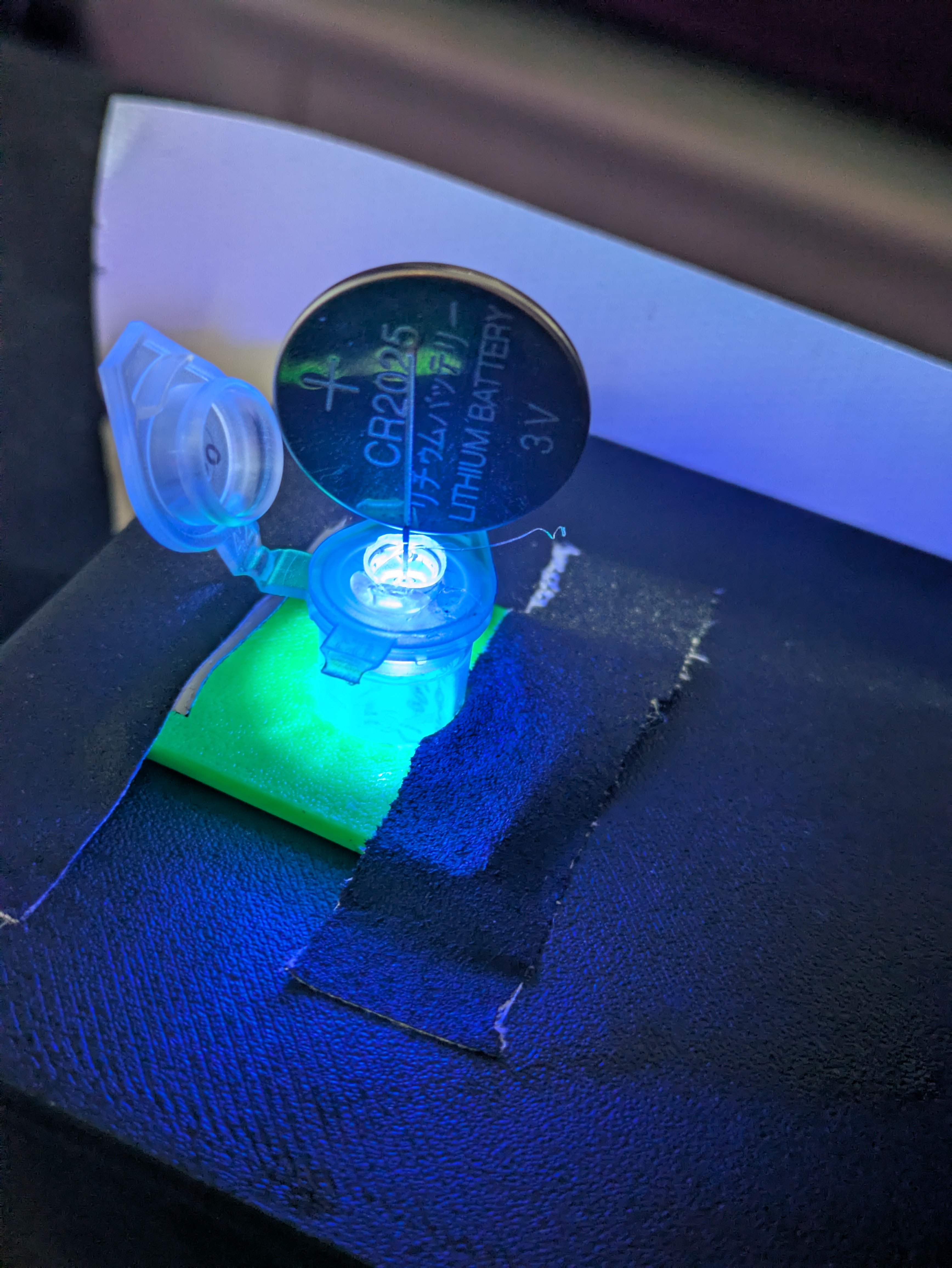 Shining the blue LED into the tube - it is glued into a spare tube lid